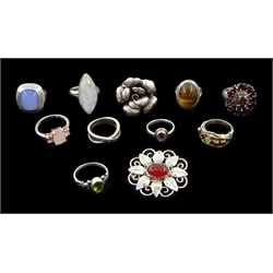 Ten silver and stone set silver rings including diamond, amethyst, agate, garnet, moonstone and peridot and a silver agate leaf brooch, all stamped or tested (11)