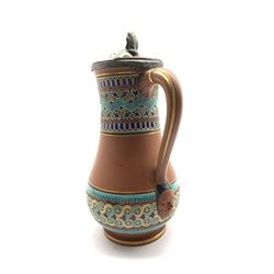 Christopher Dresser for Watcombe pottery,  Aesthetic Movement terracotta jug decorated with geometric enamel bands, the pewter cover impressed Aitken Brothers, unmarked, H20cm