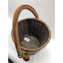 Early 20th century coopered oak fire bucket with rope twist and leather clad handle, H31cm 