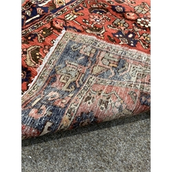 Persian Hamadan runner rug, with stylised medallion on red field, 370cm x 103cm