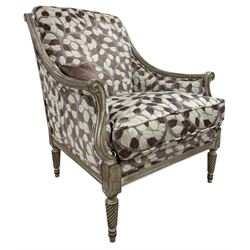French design hardwood framed armchair, moulded frame with down sweeping arms on S-scroll carved arm supports, upholstered in trailing foliage design in shades of lilac and purple, twist-turned front feet, with small complementary scatter cushion 