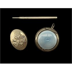 George V silver and blue enamel compact by Crisford & Norris, Birmigham 1923 D4cm, a silver rose embossed oval pill box stamped 925 and a Victorian white metal propelling pencil 