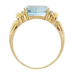 Gold emerald cut blue topaz and diamond ring, stamped 10K