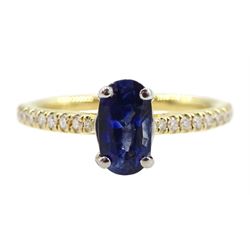 18ct gold oval sapphire ring, with diamond set shoulders, hallmarked