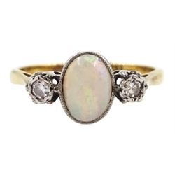 Early 20th century three stone oval opal and diamond chip ring, stamped 18ct Plat