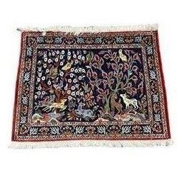 Small Persian garden rug, the field decorated with animals and birds in tree landscape, the border decorated with repeating plant motifs