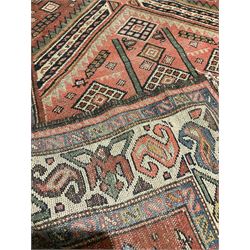 Persian runner rug, with two medallions, red field and ivory border 233cm x 112cm