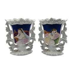 Pair of French porcelain vases, each decorated with bisque relief panels depecting a Lady in waiting, H19.5cm 