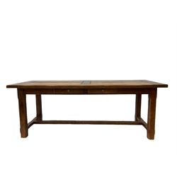 20th century oak dining table, the rectangular top over two frieze drawers, raised on squared supports united by a stretcher