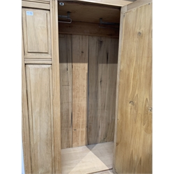 Edwardian satin walnut single wardrobe, mirrored door enclosing interior fitted for hanging, drawer to base, raised on shaped apron, W113cm, H195cm, D49cm