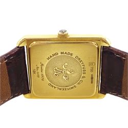 Dreyfuss & Co gentleman's 18ct gold quartz wristwatch, series No. 1974, silvered dial with Roman numerals, subsidiary seconds dial and date aperture, hallmarked, on brown leather strap, with stainless steel fold-over clasp, with certification dated 2010