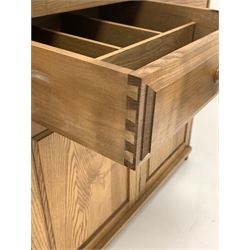 20th century elm sideboard, three drawers above three cupboards
