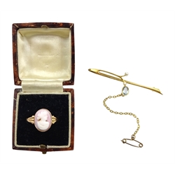 Early 20th century 9ct rose gold cameo ring, Birmingham 1919 and a gold blue topaz and pearl bar brooch, stamped 15ct