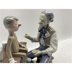 Lladro figure Pinocchio / The Puppet Painter No 05396, modelled and signed by Salvatore Furiosee, paintbrush present but separate H24cm