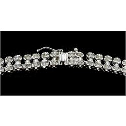 Platinum double row round brilliant cut diamond necklace, stamped Pt850, total diamond weight 5.08 carat