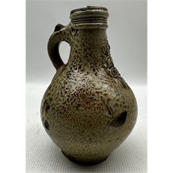 17th century Bellarmine or Bartmann salt glazed flagon, the neck applied with a mask of a bearded man H18cm. Provenance: discovered in 1953 during the redevelopment of the Portman Hotel, Portman Square, London
