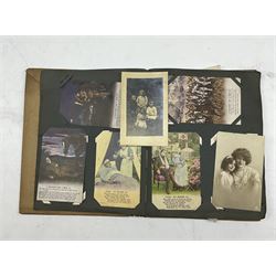 Post card album and contents including World War I Bamforth Songs cards, greeting cards etc and two other albums of vintage cards (3)