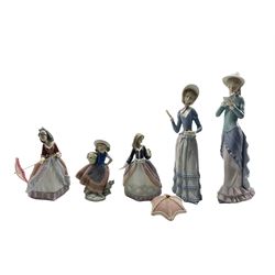 Lladro figure 'Reading' No5000 H36cm, two small Lladro figures with umbrellas and two others (5)