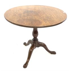 George III mahogany tilt top table, circular top raised on turned column and three splayed supports with pad feet D87cm, H73cm
