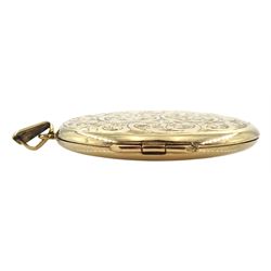9ct gold circular hinged locket, with engraved decoration, hallmarked