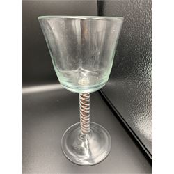 Set of six large glass goblets, H22.5cm together with a 20th century glass goblet with bucket bowl and double series twist stem, H18.5cm