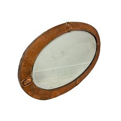 Two oval mirrors 