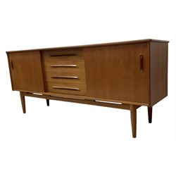 Nils Jonsson for Troeds - mid-20th century Swedish teak 'Cortina' sideboard, fitted with four central drawers flanked by sliding cupboards, raised on cylindrical tapering supports