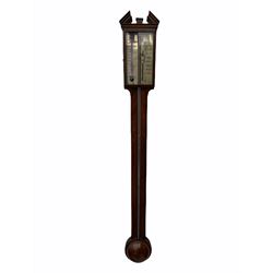 George III mahogany stick barometer and thermometer, the broken arch pediment over silvered dial with single vernier and exposed mercury tube, dial inscribed 'Mantica & Torie, Dundee' H97cm
