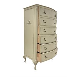 French style cream and gilt bow front chest, the gilt edged top over six drawers, raised on cabriole supports W70cm, H125cm, D47cm 