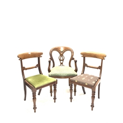  Pair of early Victorian mahogany rail back dining chairs, with drop in upholstered seat pads raised on turned front supports, (W47cm) and a Victorian mahogany carver with pierced splat and lobe carved front supports, W58cm  