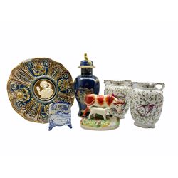 19th/ early 20th century Austrian wall charger, pair of Victoria twin-handled vases, Carlton Ware Mikado pattern vase, Empire Works Delft style stationery rack and cover and Staffordshire model of a Cow and calf 