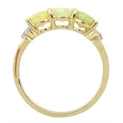 9ct gold three stone opal ring, with pierced diamond set shoulders, hallmarked 