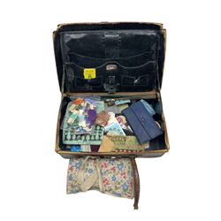 Small leather suitcase and contents of sewing items
