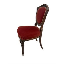 Set six late 19th century carved walnut dining chairs, foliate cresting flanked by carved ribbon decoration, over upholstered back and seat, raised on fluted turned supports 