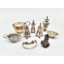 Pair of silver pepperettes Birmingham 1942, two others, silver mustard pot, two silver salts and other condiments 7.7oz