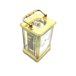  Early 20th century brass four glass carriage time piece, white enamel dial with Roman numeral chapter ring,  movement stamped 'H J, Made in Paris' H14cm  