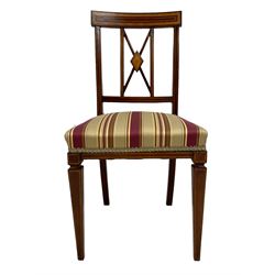 Edwardian set eight mahogany dining chairs, the rectangular cresting rail inlaid with satinwood banding and stringing, x-frame lozenge back with shell inlay, seats upholstered in striped fabric, on square tapering front supports with stringing, two carvers and six side chairs 
