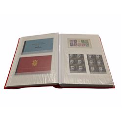 Queen Elizabeth II mint decimal stamps, housed in a stockbook, face value of usable postage approximately 350 GBP