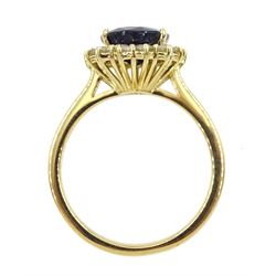 18ct gold oval sapphire and round brilliant cut diamond cluster ring, hallmarked sapphire approx 2.50 carat, total diamond weight approx 0.50 carat