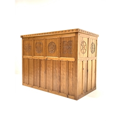 'Catman' pitch pine bar, adzed top over panelled front carved with floral roundels, open shelf, sliding doors and cupboard to reverse, by Chris Checksfield of Whitby (Ex Gnomeman) W140cm, H107cm, D79cm