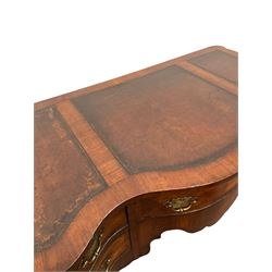 Queen Anne style serpentine walnut writing table, the leather inset top over one long and four short drawers, raised on cabriole supports with acanthus leaf carvings