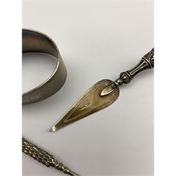 Scottish silver oval serviette ring Edinburgh 1942,  trowel book mark by Crisford and Norris marked 'Silver'  and a propelling pencil 