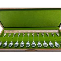 Cased set of twelve Royal Horticultural Society silver flower spoons, each with a silver gilt terminal cast as a different flower Sheffield 1981 Maker John Pinches 9.7oz