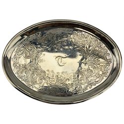George III silver oval teapot stand engraved with pagodas, scrolls and monogram on four shaped supports W15cm London 1800 Maker possibly Solomon Hougham
