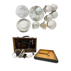 Early 19th century tea service for twelve comprising cups, saucers, side plates, slop bowl, sugar bowl, milk jug etc and a Vintage cased Singer 99k sewing machine, model no. EJ16225 with faux crocodile carry case converted to electricity H33cm