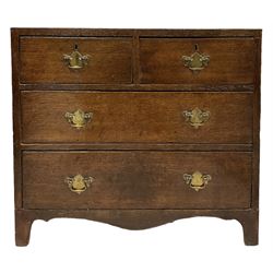 Georgian oak chest of drawers, fitted with two short and two long drawers, raised on bracket supports 