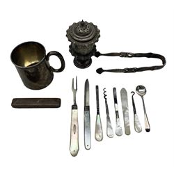 Small silver christening mug engraved with initials H7cm Birmingham 1912 Maker William Aitken, early 19th century silver sugar tongs, early 19th century silver knife with folding blade and mother of pearl handle, similar fork, various manicure implements and a pepperette 