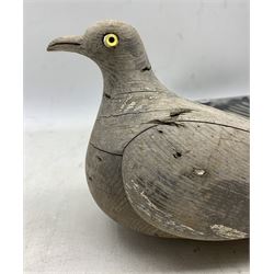 Carved and painted wooden Decoy pigeon, lacking one glass eye, L31cm and another in aluminium (2)