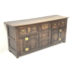Georgian oak dresser, with two long and one short drawer over two fielded panelled cupboards enclosing a shelf, raised on stile supports, (W180cm, H80cm, D51cm) together with an associated 19th century oak and pine delft rack, (W160cm)
