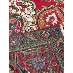 Hand knotted Persian rug from Tabriz region with red field, red border and all over floral design (395cm x 295cm